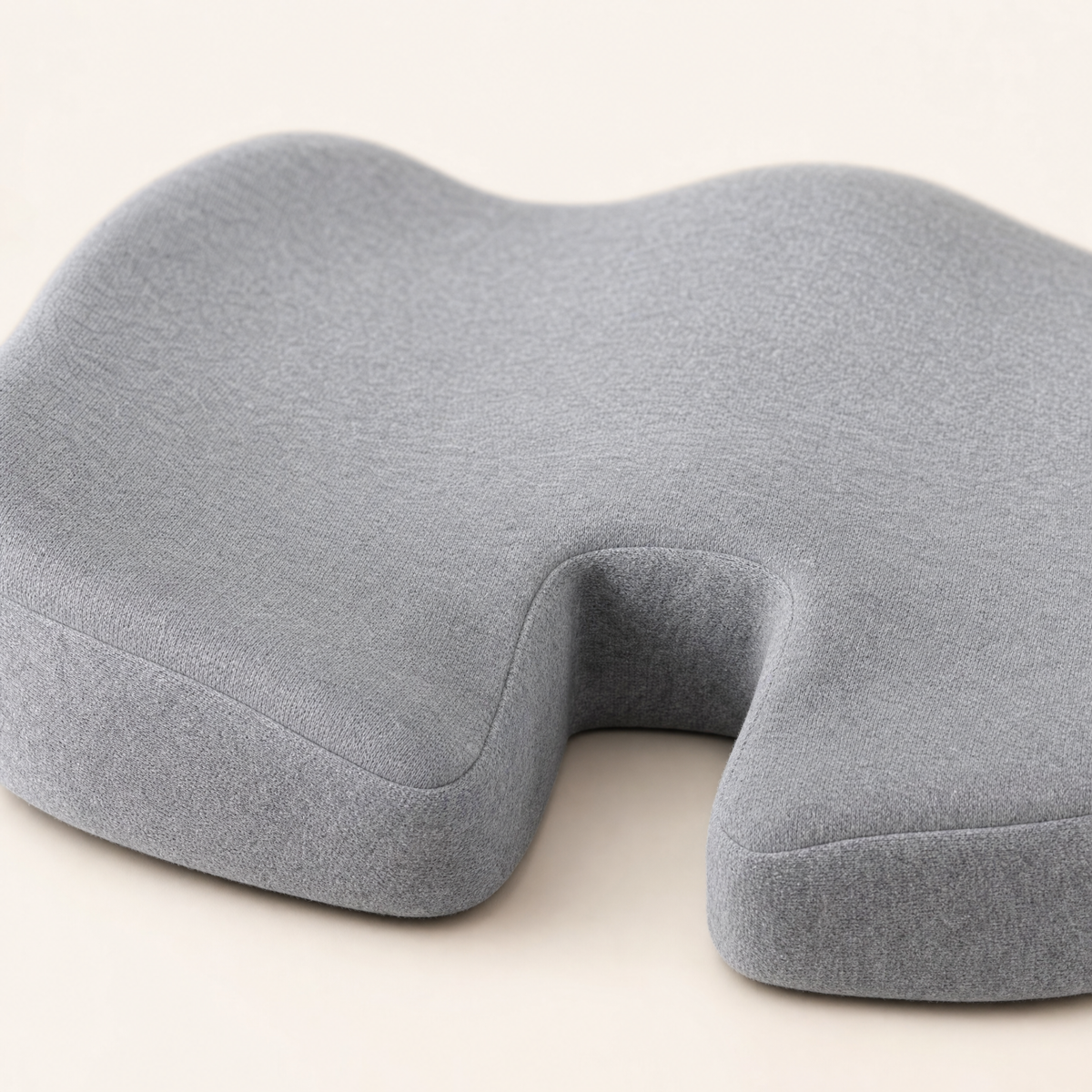 Close detail of the coccyx relief channel on the VESU Orthopedic Seat Cushion