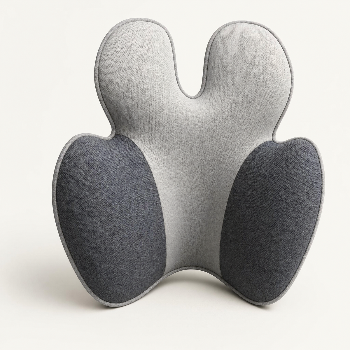 Close detail of the VESU Orthopedic Lumbar Cushion contour depth